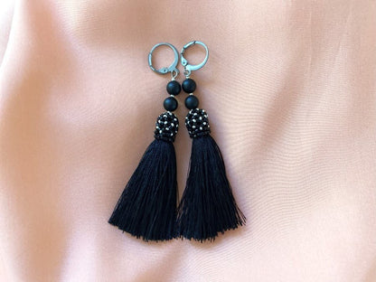 Handmade earrings are crafted from black tassels, covered with a floral cap made from Miyuki beads - Ornamentico shop