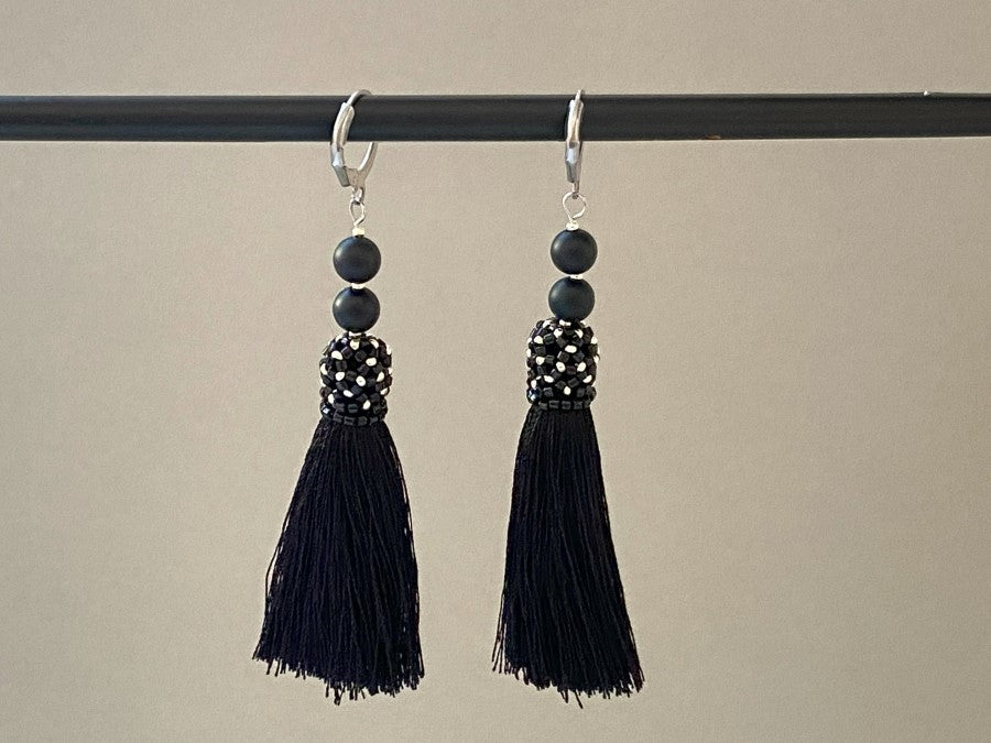 Handmade earrings are crafted from black tassels, covered with a floral cap made from Miyuki beads - Ornamentico shop