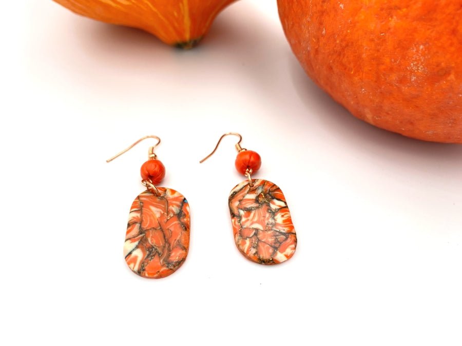 Handmade earrings made from polymer clay decorated with pumpkin bead - Ornamentico shop