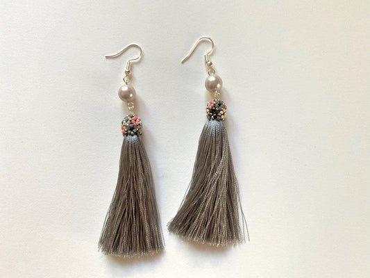 Handmade earrings are crafted from shimmering silver grey tassel which is covered with a floral cap from beads - Ornamentico shop