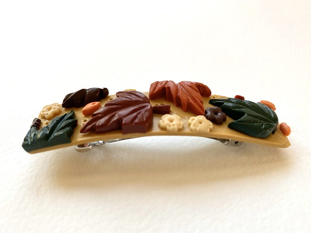 Handmade hair barrette decorated with polymer clay ornament featuring autumn maple leaves - Ornamentico shop