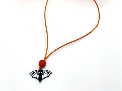 Handmade leather necklace for Halloween with glass bat charm and clay bead - Ornamentico shop