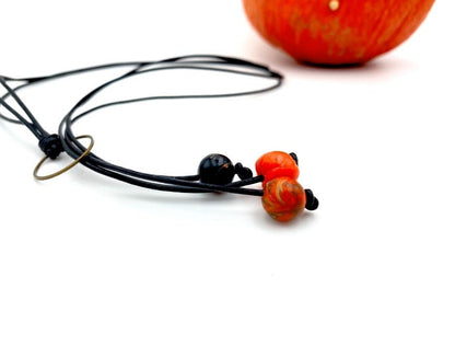 Handmade necklace  in lariat style with orange, black and pumpkin-shaped beads from polymer clay - Ornamentico shop
