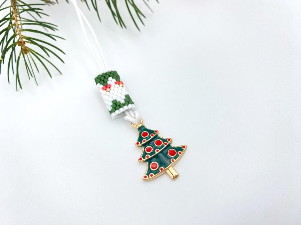 Handmade necklace is featuring elegant charm in the shape of Christmas tree accented with beaded inlay - Ornamentico shop