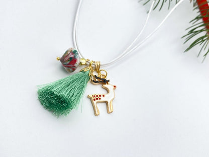 Handmade necklace with enamelled charm pendant, light green rayon tassel and a hand made polymer clay bead - Ornamentico shop