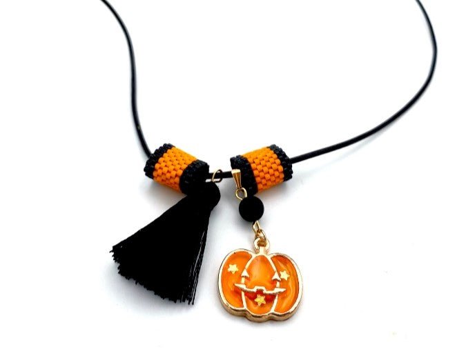 Handmade leather necklace with Halloween pumpkin charm and tassel - Ornamentico shop