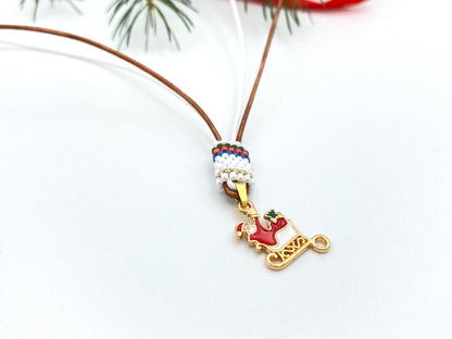 Handmade leather necklace decorated with enameled charm in the shape of Santa accented with beaded inlay - Ornamentico shop