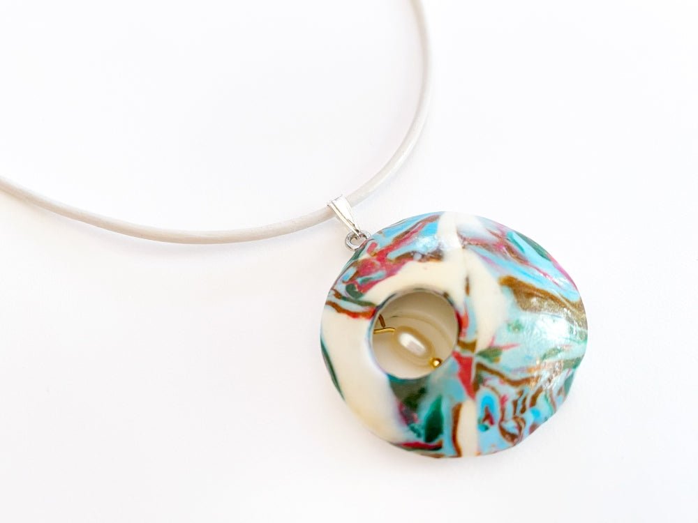 https://ornamentico.shop/cdn/shop/products/handmade-pendant-marble-swirl-811745.jpg?v=1701188981&width=1445