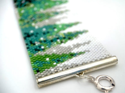 Handmade bracelet beaded from Japanese Miyuki glass beads featuring winter forest - Ornamentico shop