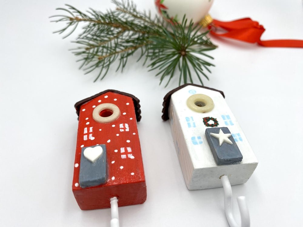 Two handmade wooden hooks in the shape of Christmas decorated houses - Ornamentico shop
