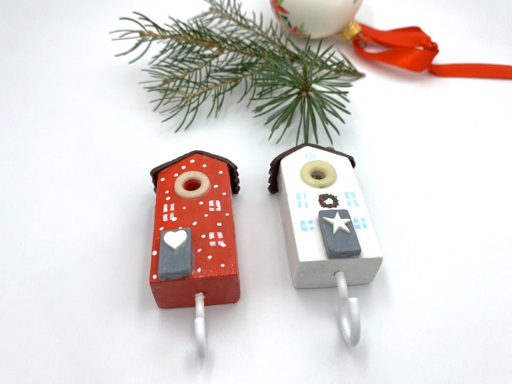 Two handmade wooden hooks in the shape of Christmas decorated houses - Ornamentico shop