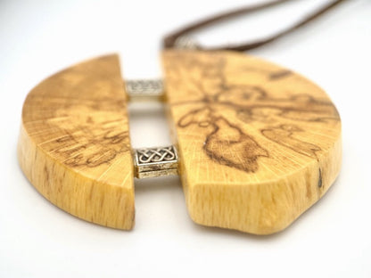 Medium size wooden pendant made from finely polished wood with silver inlays on a woven leather strap - Ornamentico shop