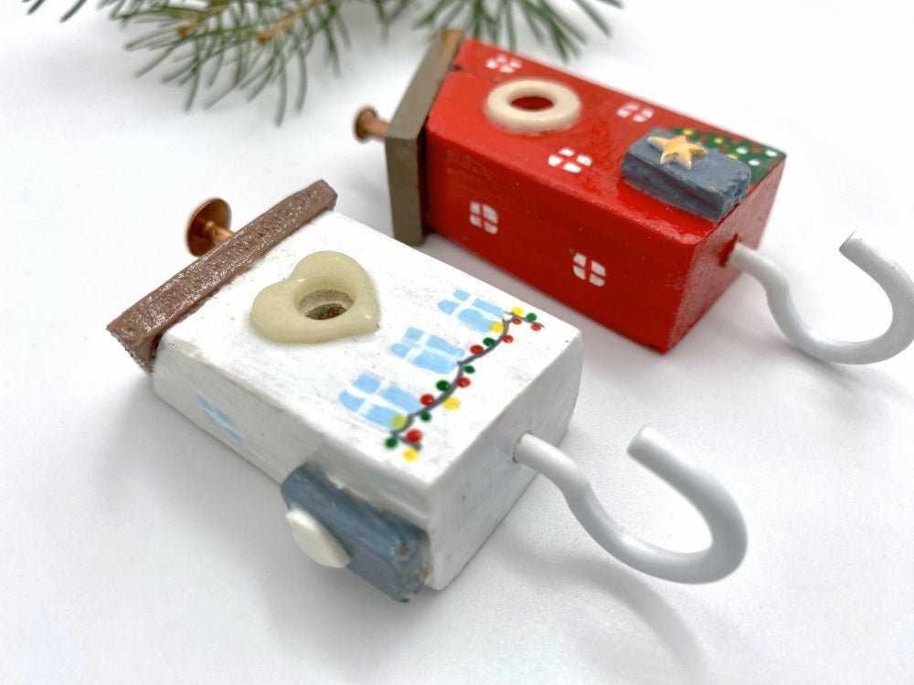 Two handmade wooden painted hooks in the shape of decorated houses - Ornamentico shop