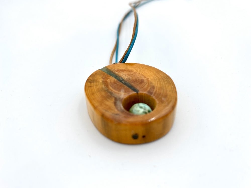 Handmade wooden pendant. Made of polished and lacquered beech wood with one Peruvian turquoise stone - Ornamentico shop